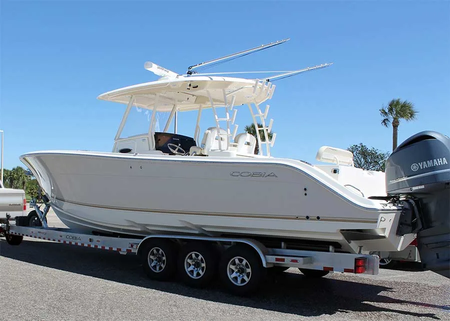 Hamilton boat loaded on a trailer for recovery and towing