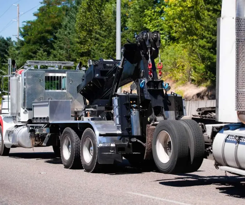 heavy-duty wrecker on a Ancaster highway shoulder